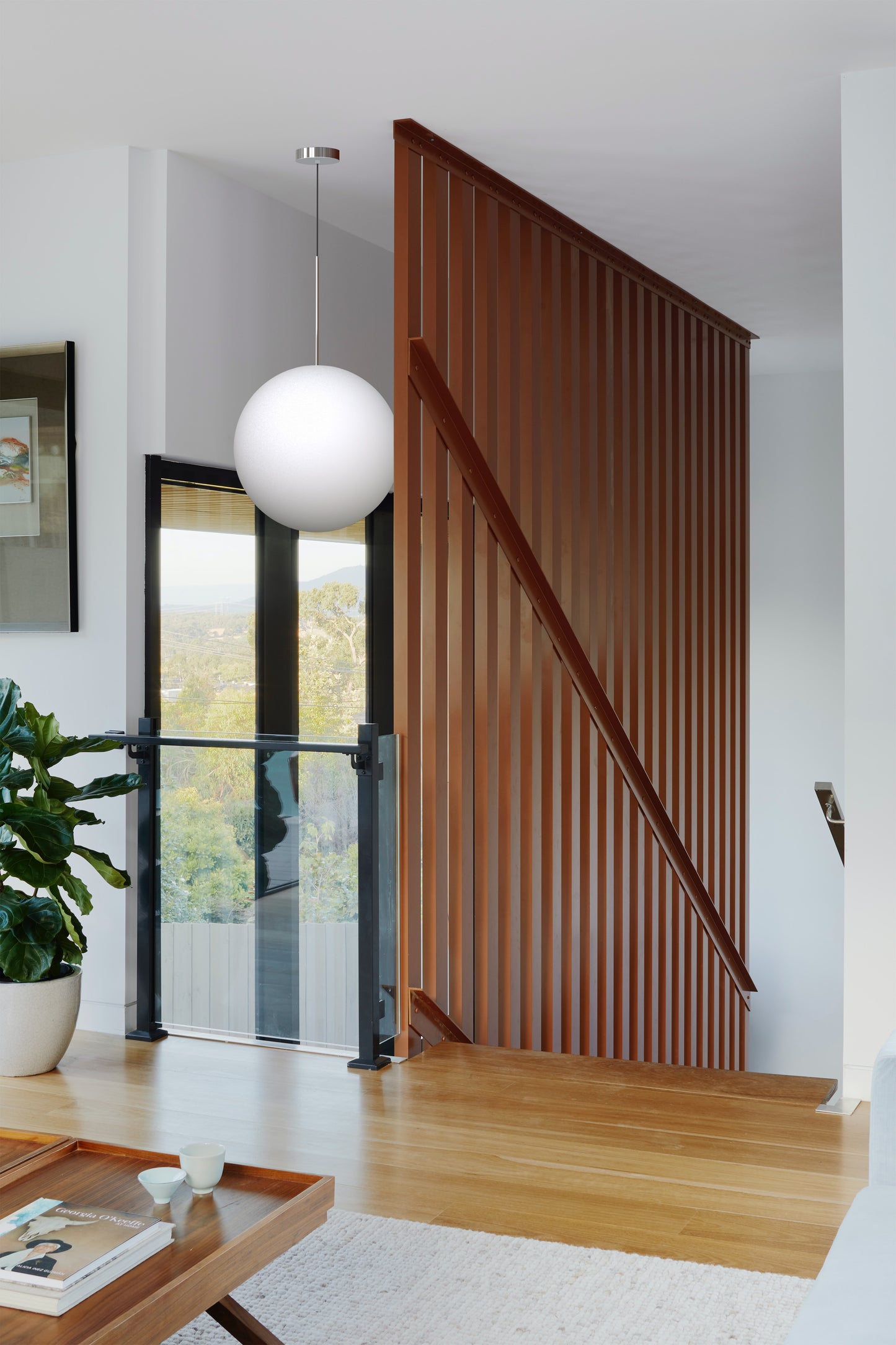 Bola Sphere Pendant red stairway environment